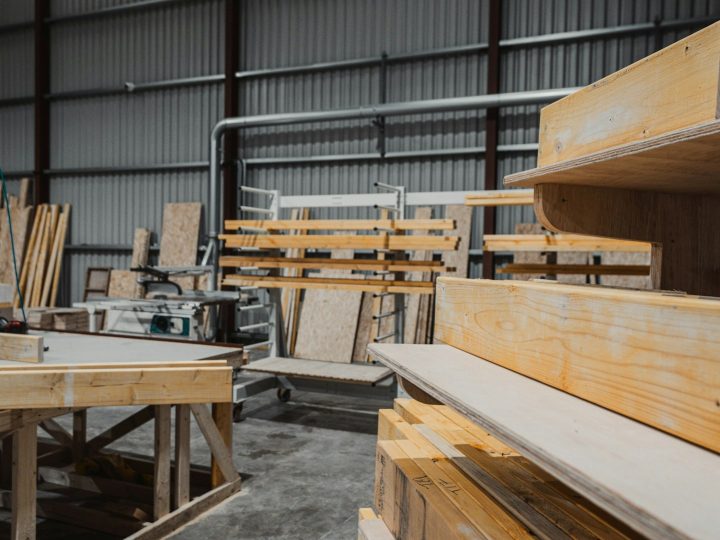 Stacks of plywood sheets in an industrial warehouse